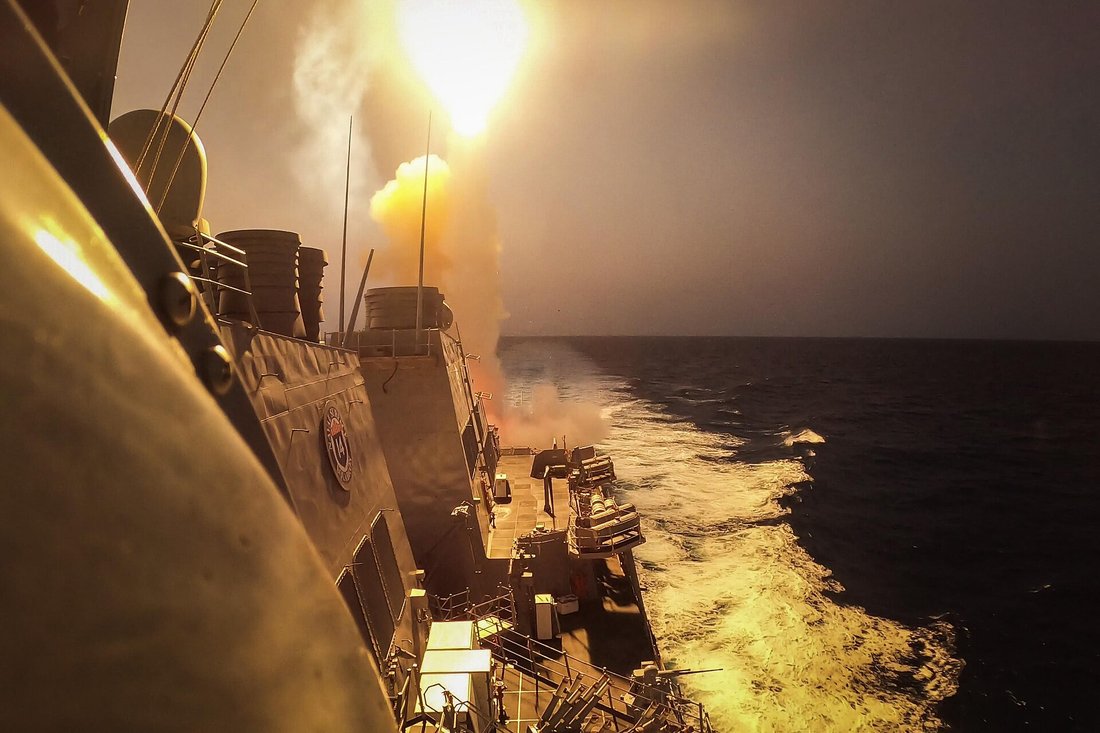 The guided-missile destroyer USS Carney intercepts Houthi missiles and drones over the Red Sea